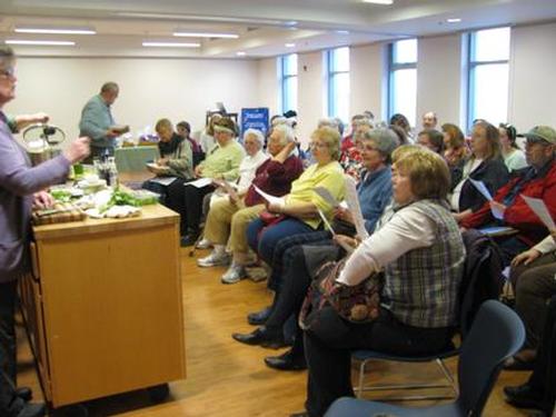 Large crowd at the Basil King of Herbs program.