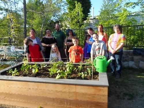 Several families enjoyed a community gardening program at the APL led by Laurie Parker & Aimee Hanson.