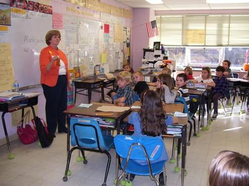 Community Reading Day 2010 - Bonnie Hodgdon reads to the 3rd grade at the Pleasant St. School