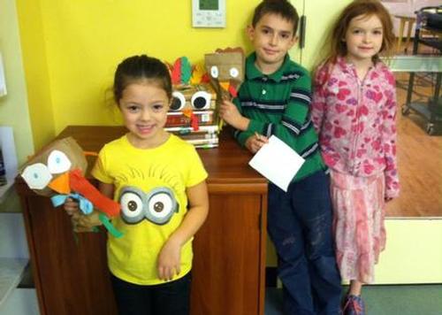 Children made turkeys in a fall craft program.